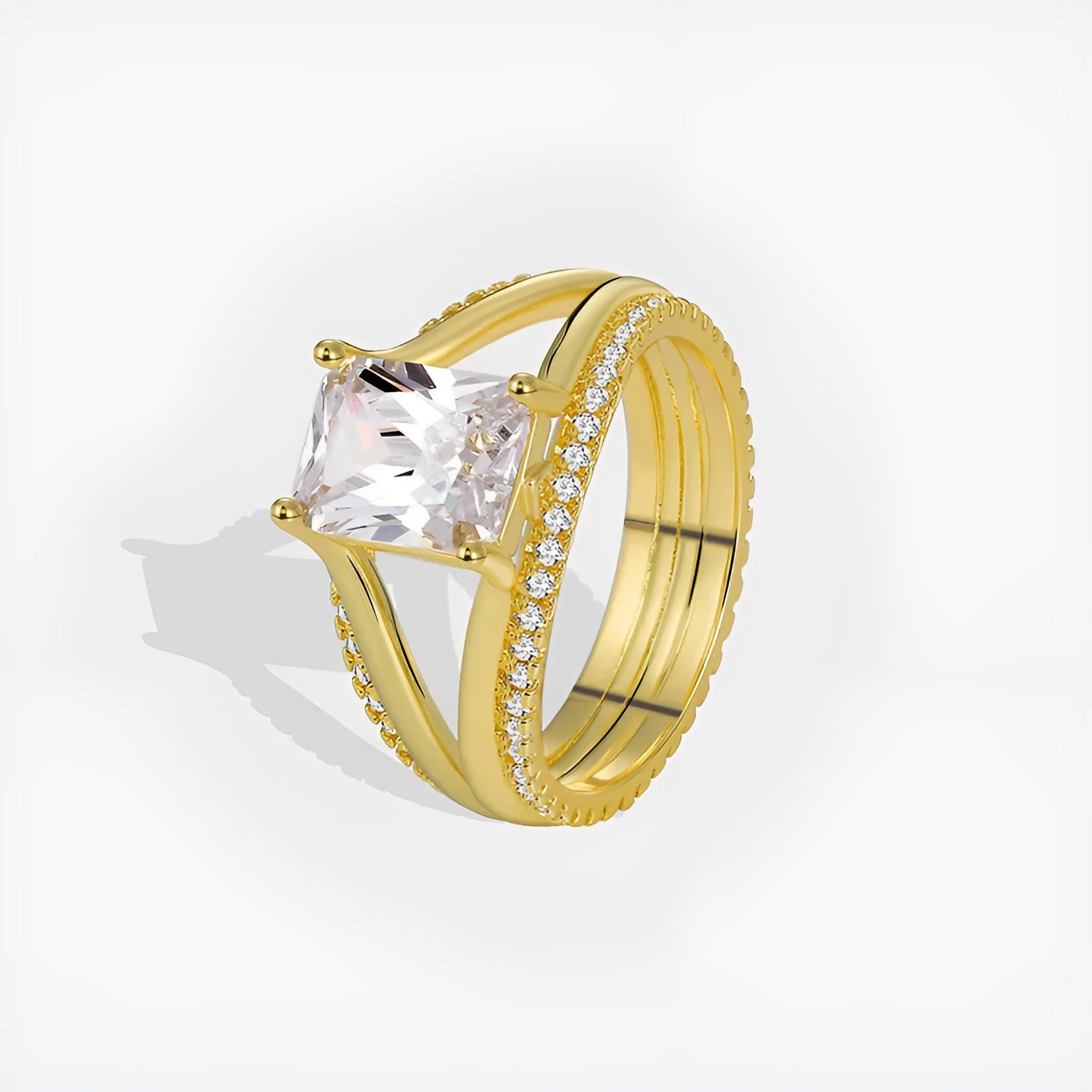 Gold-coloured geometric women's copper ring with a square zircon stone.