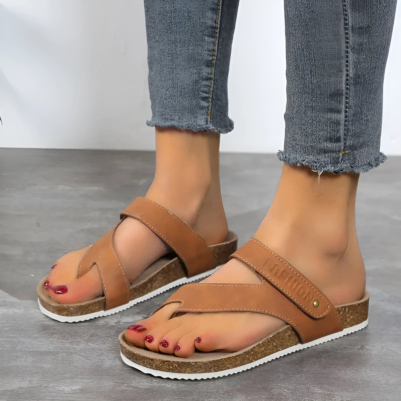 Flat toe ring flip-flops in blue with thick foam sole and artificial PU upper