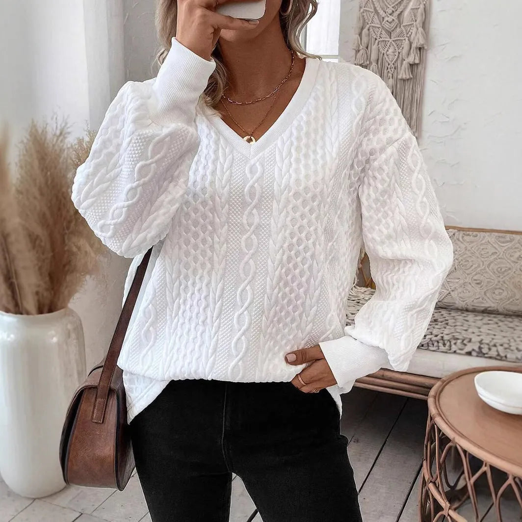 Milky white loose fit casual t-shirt with a raised 3D pattern on the front.