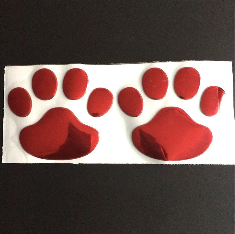 PVC car sticker with dog footprints pattern measuring 7cm long in hand-shaped brush design