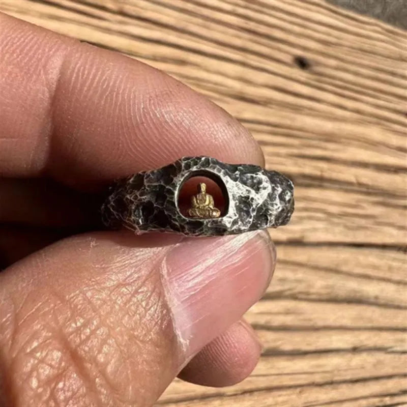 Hand-forged copper ring with grotto Buddha design and textured rock surface in size 8