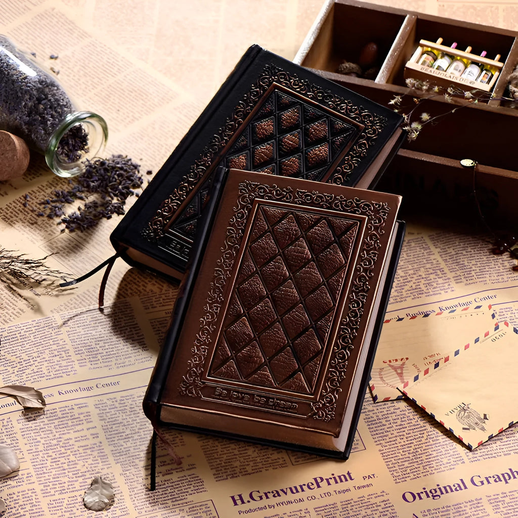 Embossed faux leather notepad with three-dimensional cover design in bronze or black gold colour