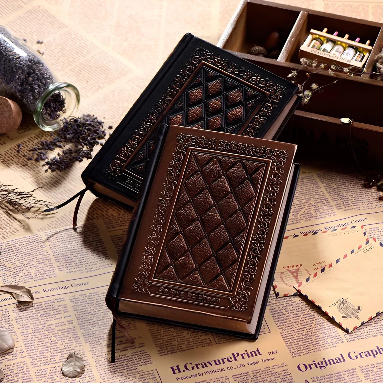 Embossed faux leather notepad with three-dimensional cover design in bronze or black gold colour
