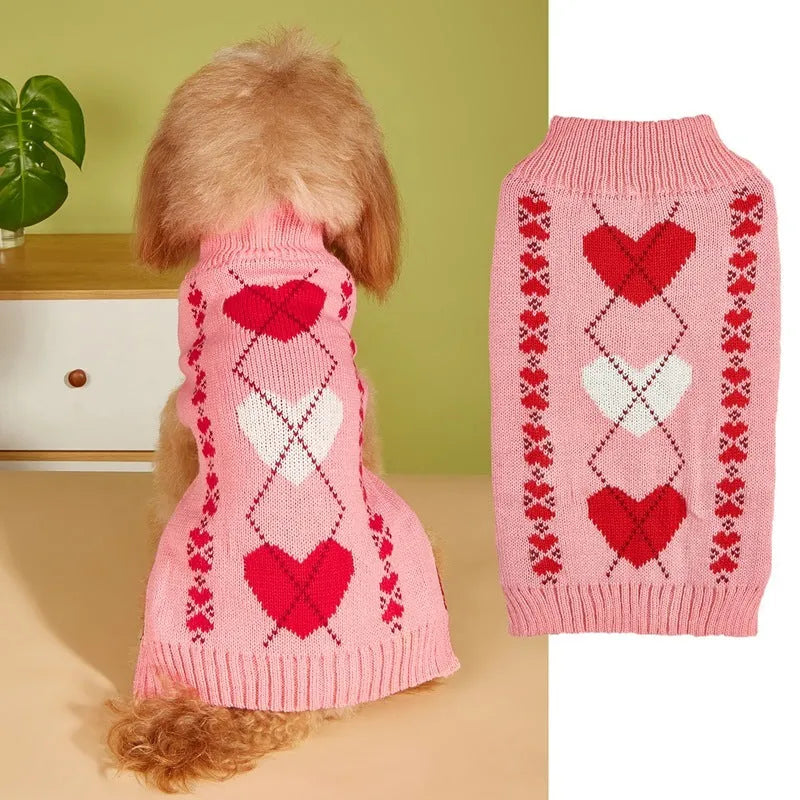 Red love heart design on a pink acrylic dog sweater for a small dog.
