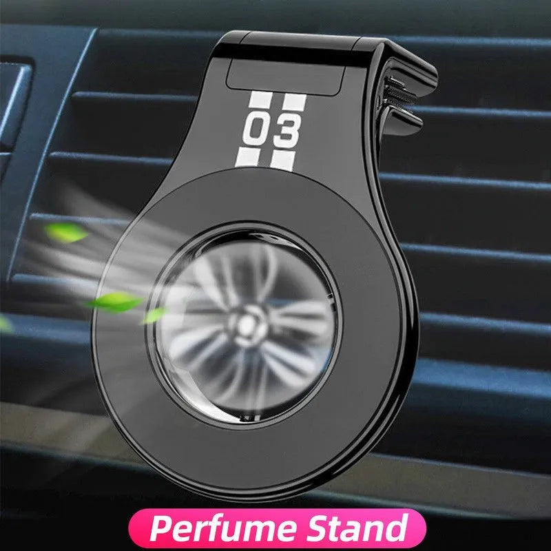Black magnetic car air vent phone holder with adjustable angle and built-in perfume diffuser.