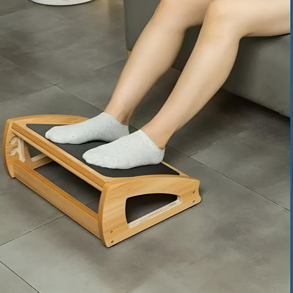 Adjustable bamboo office desk footstool in natural wood colour with modern simple design