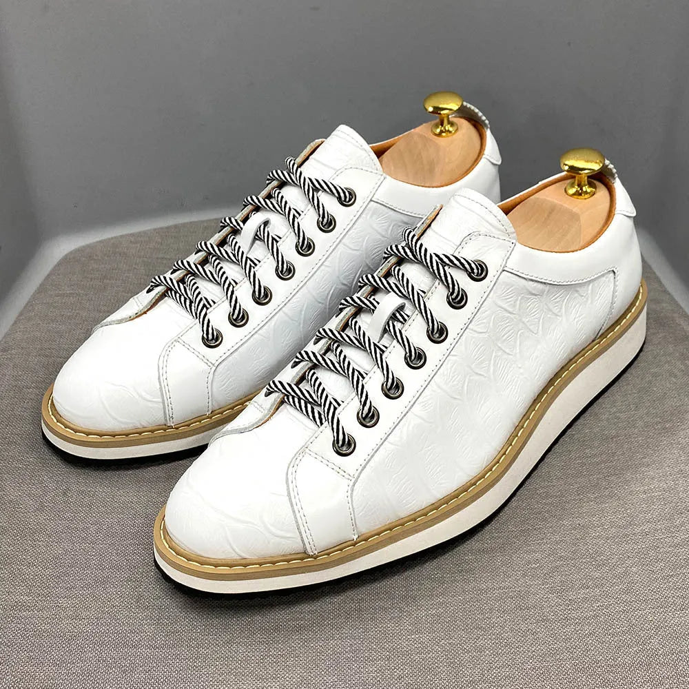 Men's black pattern-embossed handmade low-top shoes with front tie style on a white background.
