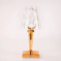 Rose gold-plated portable rechargeable touch night light on a surface