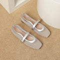 Women's beige mesh flat-heel pumps with square toe and buckle fastener on a white background.