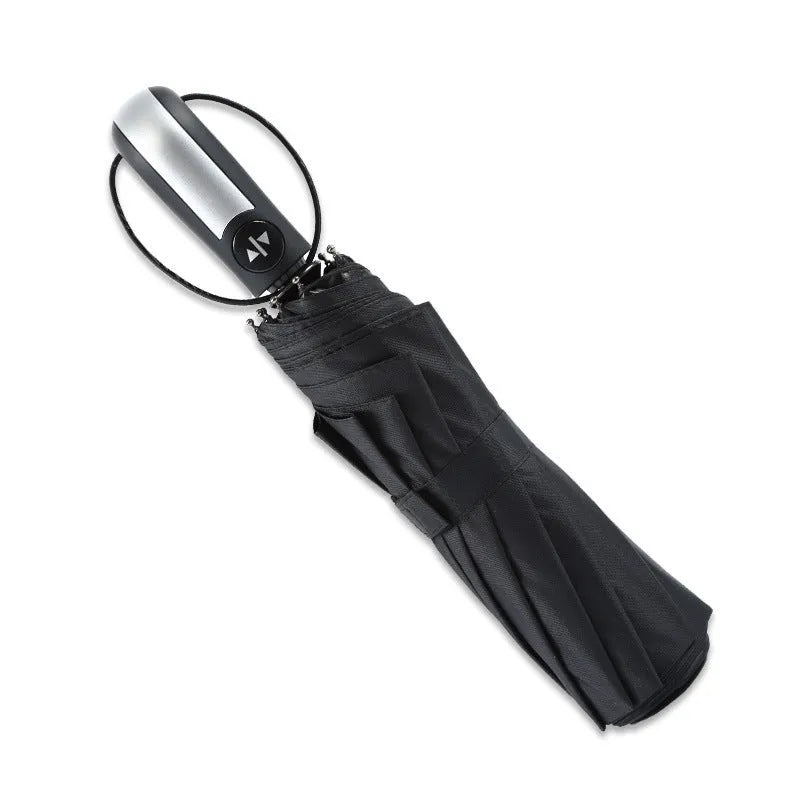 Automatic triple folding black business sun shade umbrella with steel ribs and a rubber handle.