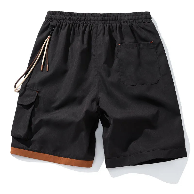 Man wearing coffee-coloured loose-fit bamboo fibre plus size sports shorts with a high waist.