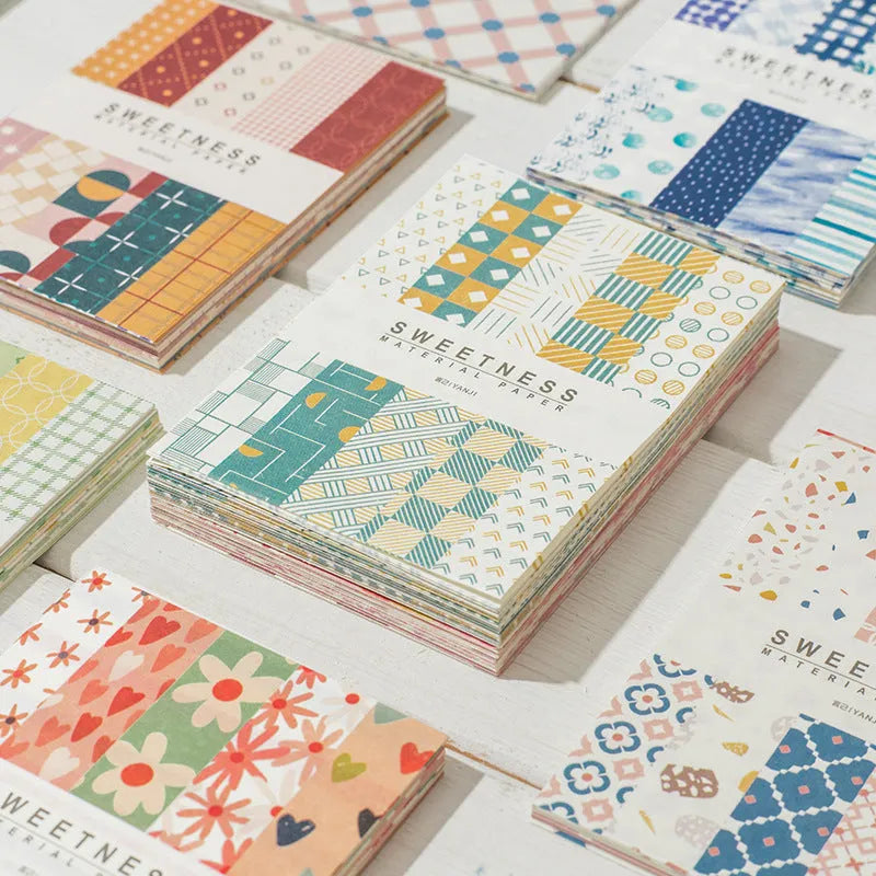 Pack of 50 retro collage design note papers in dessert-themed colours, each sheet 56mm by 83mm.