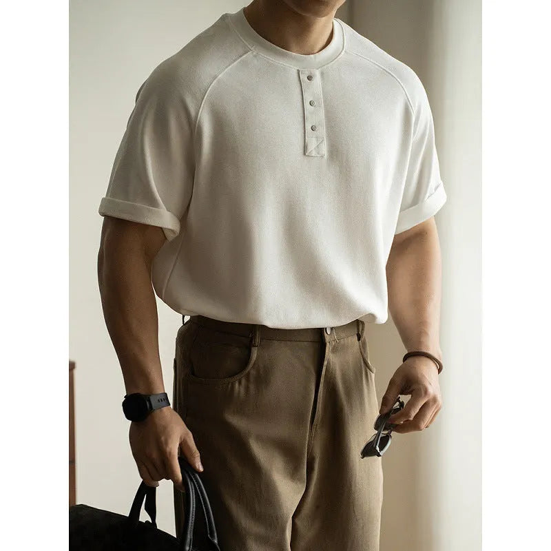 Women's loose-fitting casual pullover top with raglan sleeves in a terry texture fabric.
