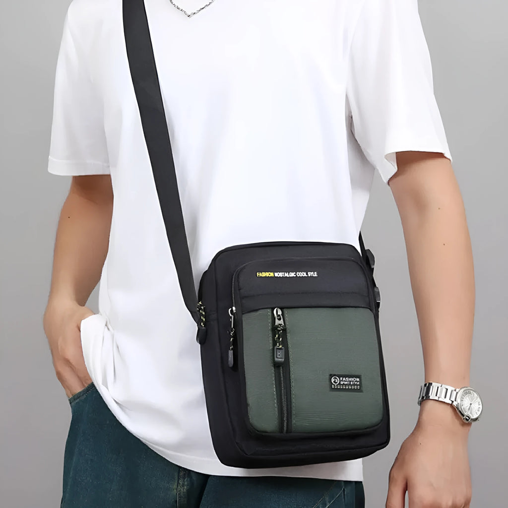 Men's nylon crossbody messenger bag with sewing thread detailing shown in available colours