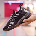 Men's white flying fabric sports shoes with mesh lining, round toe, and flat platform heel
