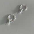 Geometric star-shaped ear clips with electroplated platinum finish on copper construction