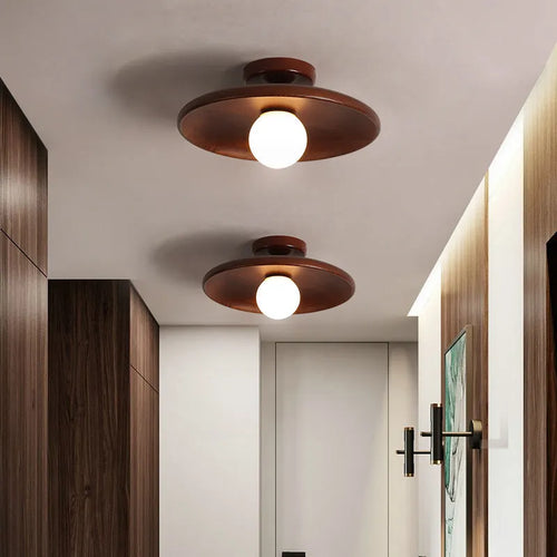 Modern solid wood ceiling lamp with glass shade in wood or walnut finish, available in three sizes.
