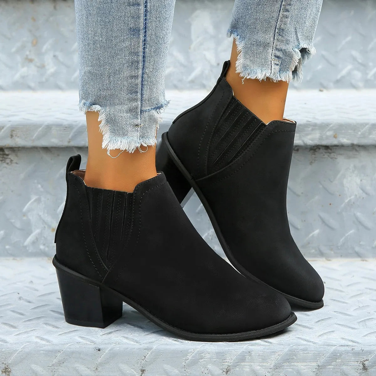 Women's black ankle boots with pointed toe and thick square heel, slip-on design for autumn winter wear