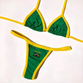 Yellow women's two-piece bikini set with T-back bra and shorts on a neutral background.