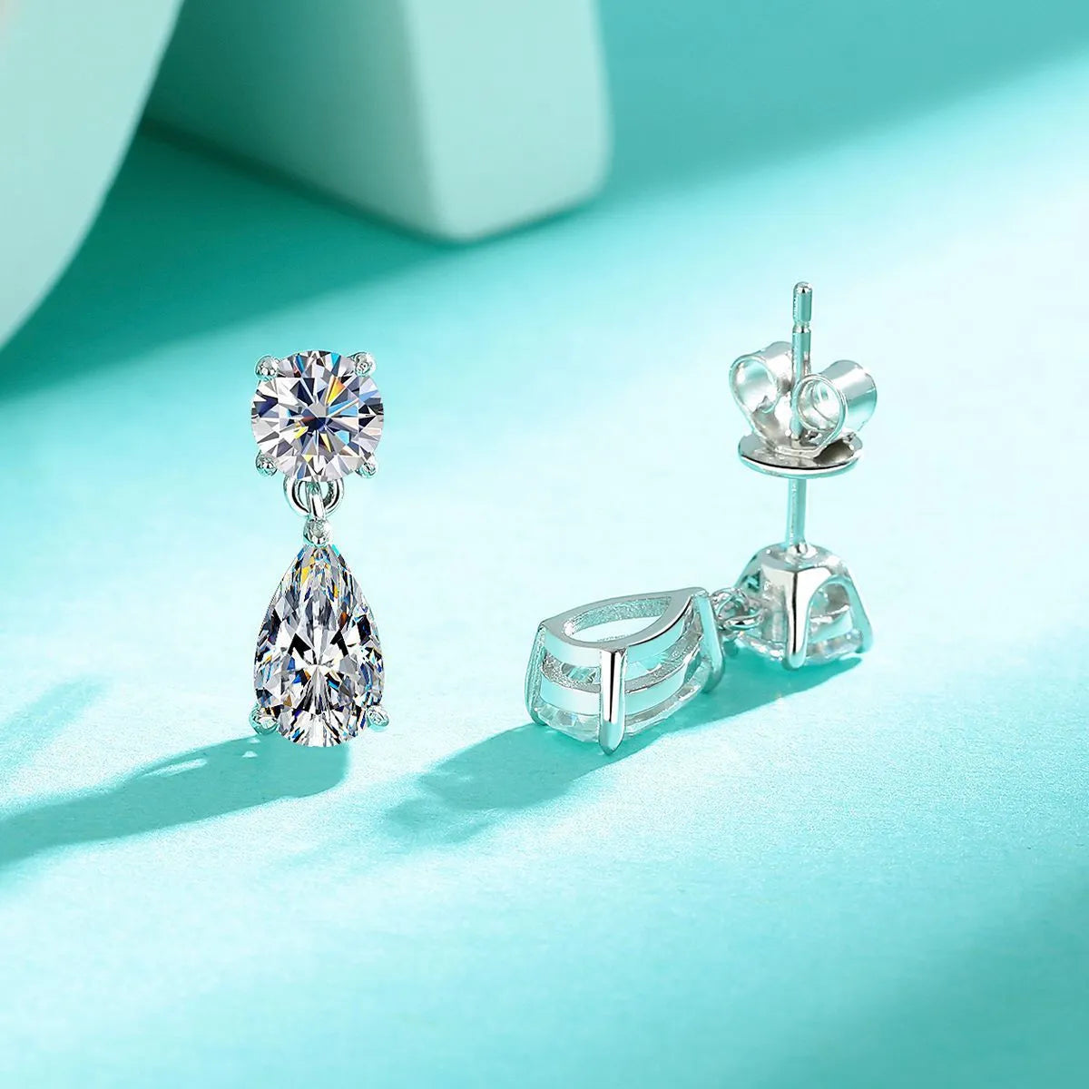Sterling silver water drop moissanite stud earrings with geometric design in gold or silver colour