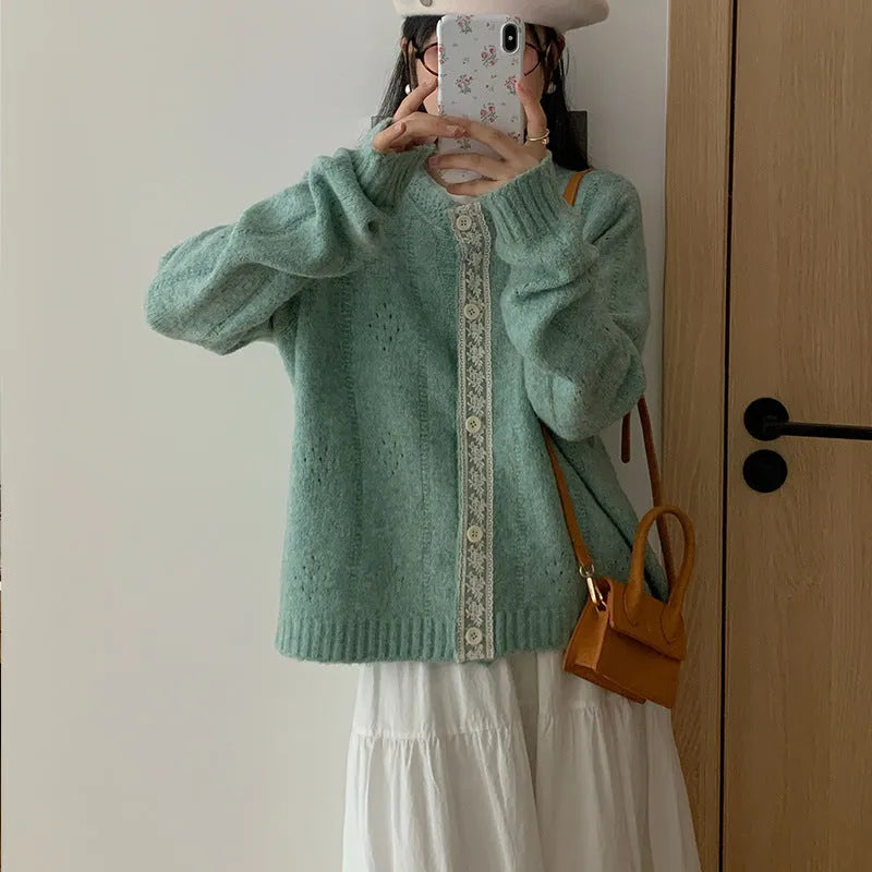 Art retro style loose-fit sweater coat in viscose fibre, shown in apricot colour.