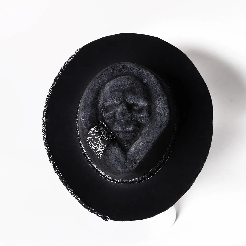 Handmade wool skull hat with conical crown design shown in single colour option