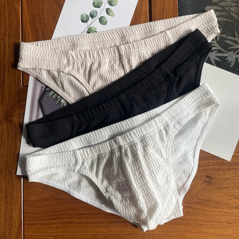 Men's solid colour cotton triangle underwear briefs in mid-waist design with body shaping fit