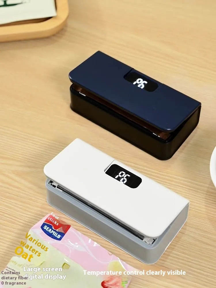 Small portable mini heat sealing machine for plastic food bags in white or blue