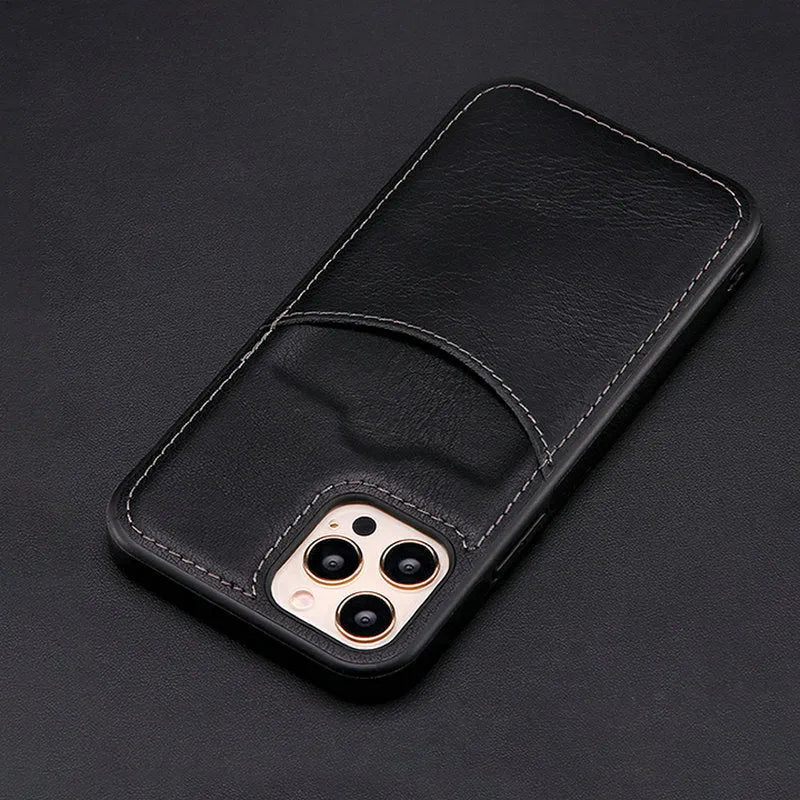 Dark blue PU leather protective case for iPhone models on a table.