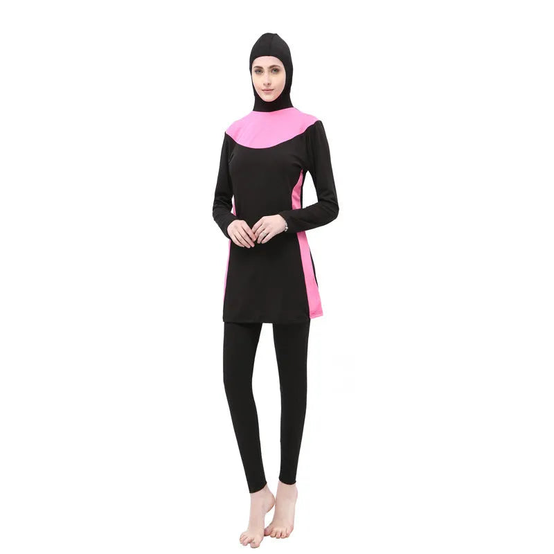 Conservative long-sleeved hooded two-piece swimsuit for women in black with coloured accents.