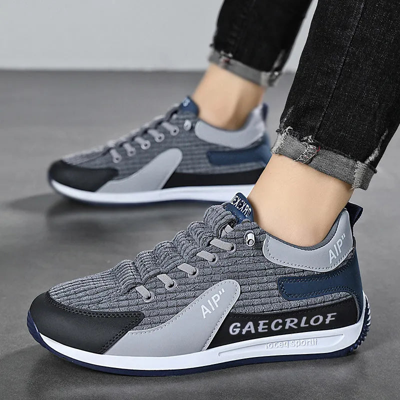 Men's green and grey mesh running shoes with lace-up front and round toe