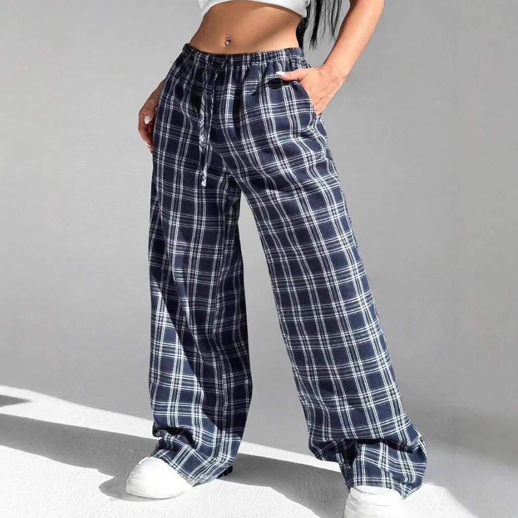 Women's loose fit plaid trousers with drawstring waistband and side pockets in blue colour
