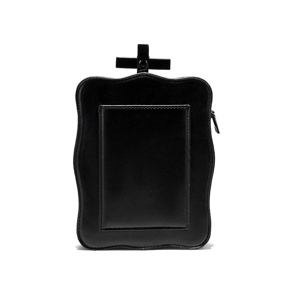 Black mini square crossbody bag with Halloween skull design, chain strap, and Gothic stitching details