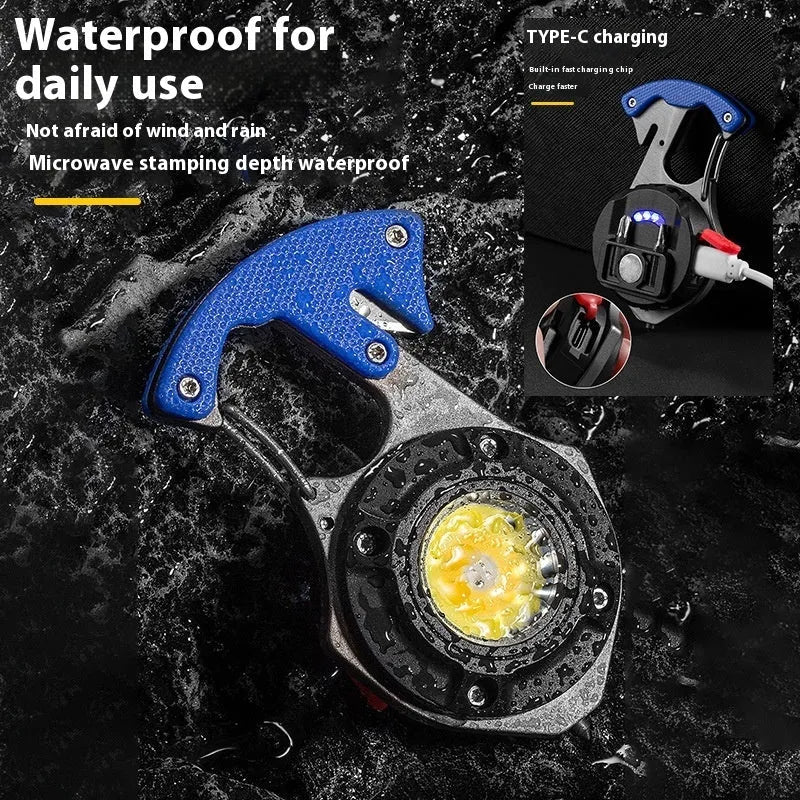 Compact silver and black multifunction keychain torch with window breaker tip and seven LED light modes.