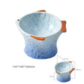 Blue fish-shaped ceramic cat bowl with elevated base and tilted food well