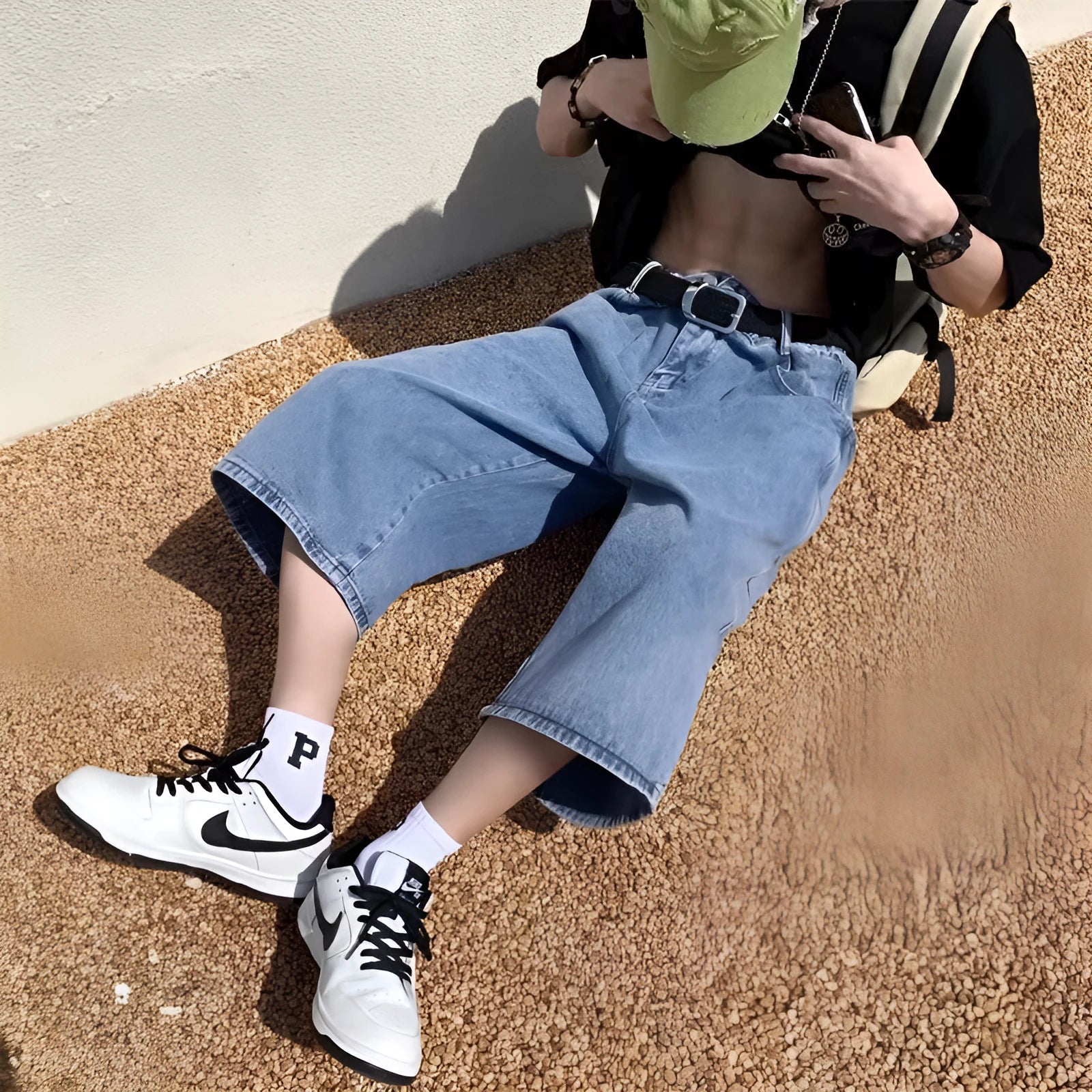 Men's blue washed denim pirate shorts with cropped length and high waist
