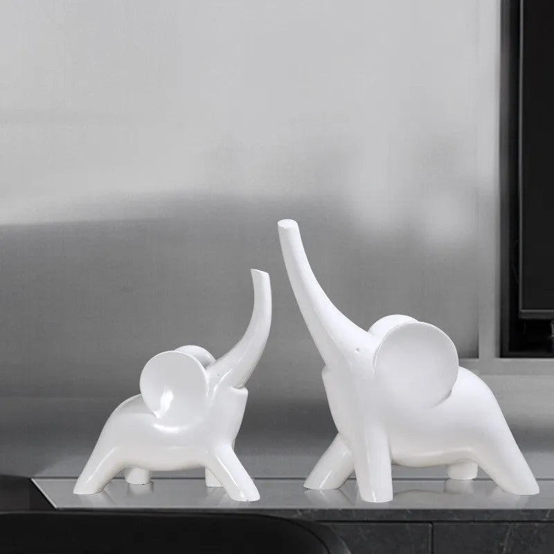 Modern rose gold and white resin elephant ornament figurine for home decor.