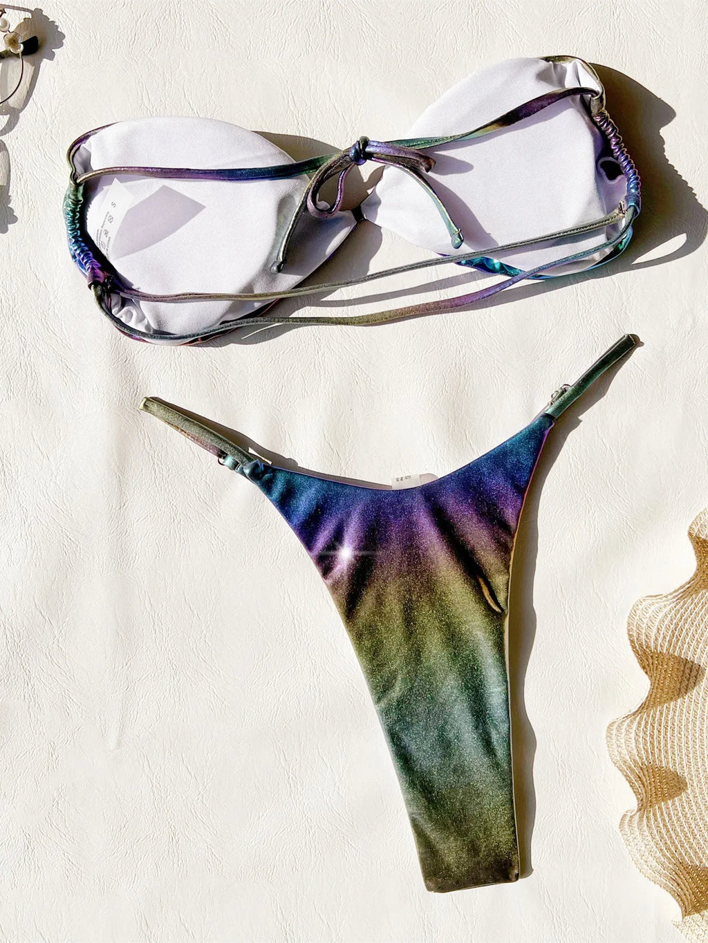 Women's gradient purple bikini set showing colour transition on two-piece swimwear