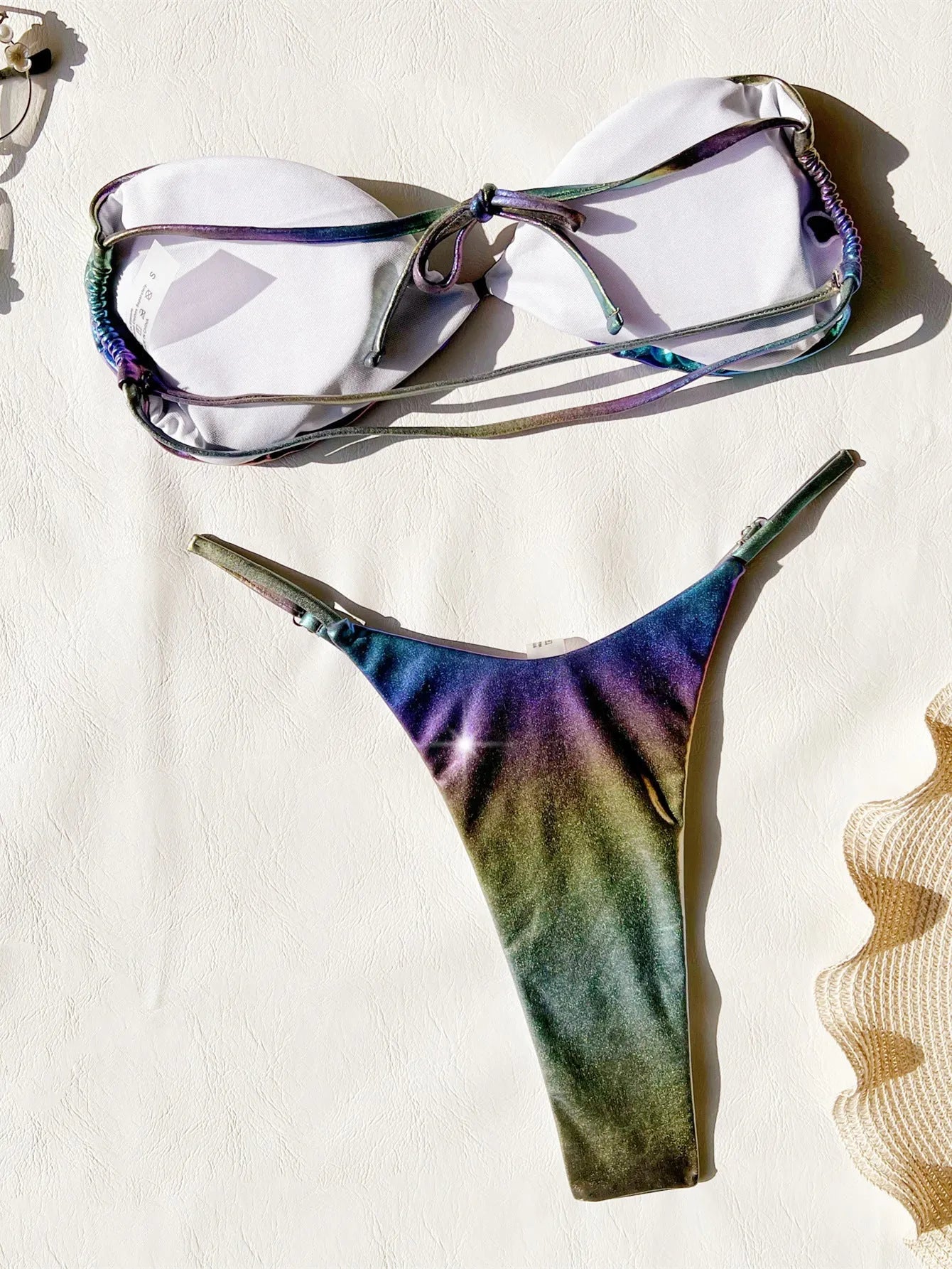 Women's gradient purple bikini set showing colour transition on two-piece swimwear