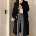 Loose large knitted women's cardigan in chenille fabric, shown in light grey colour
