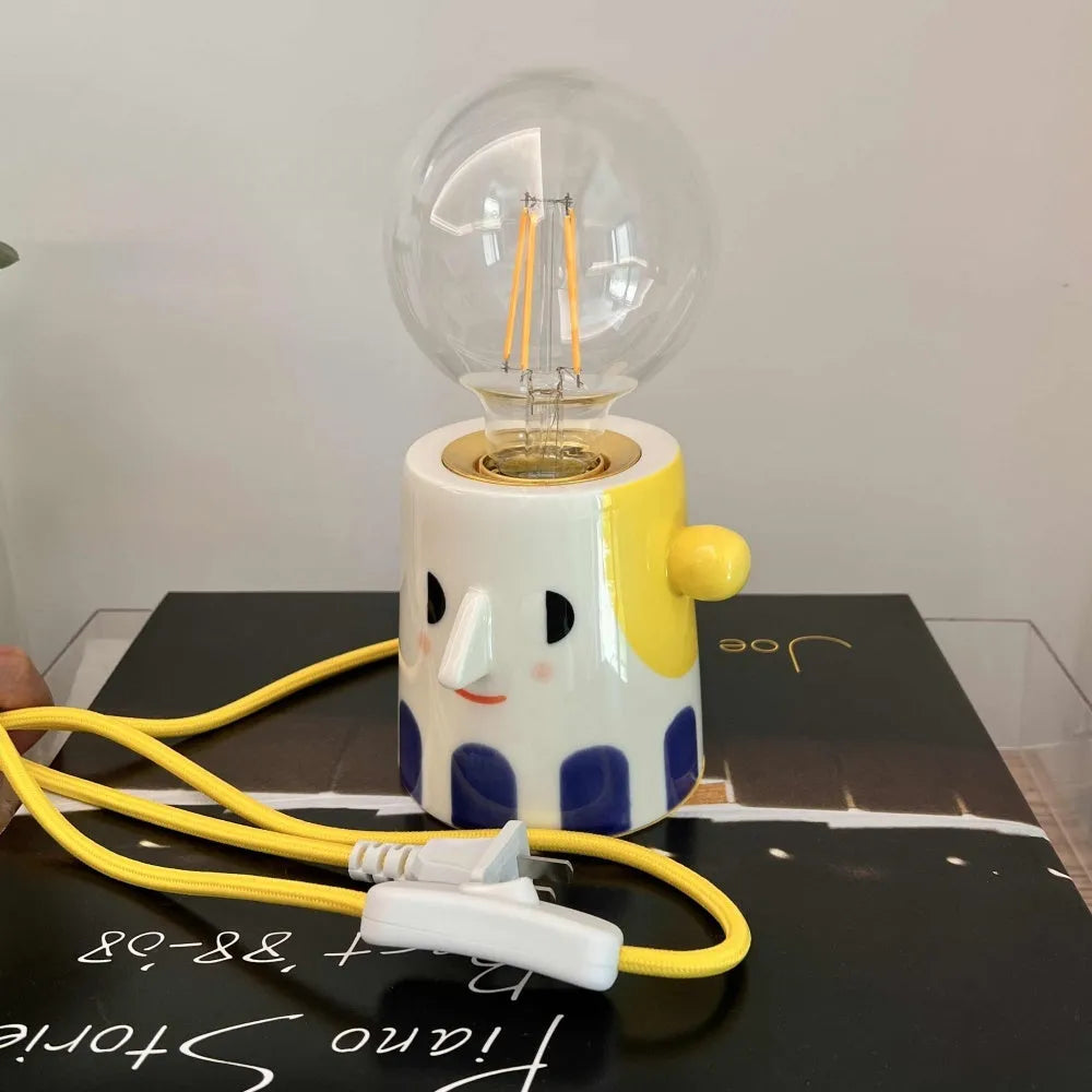 Handmade ceramic bedside lamp with ball headlight decorative design