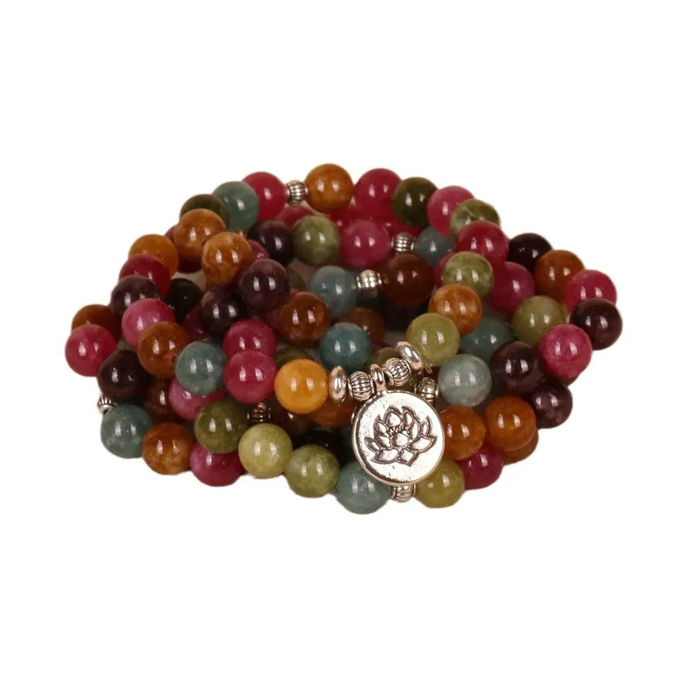 108-bead alloy bracelet with a multi-layer lotus charm in a natural tourmaline colour.