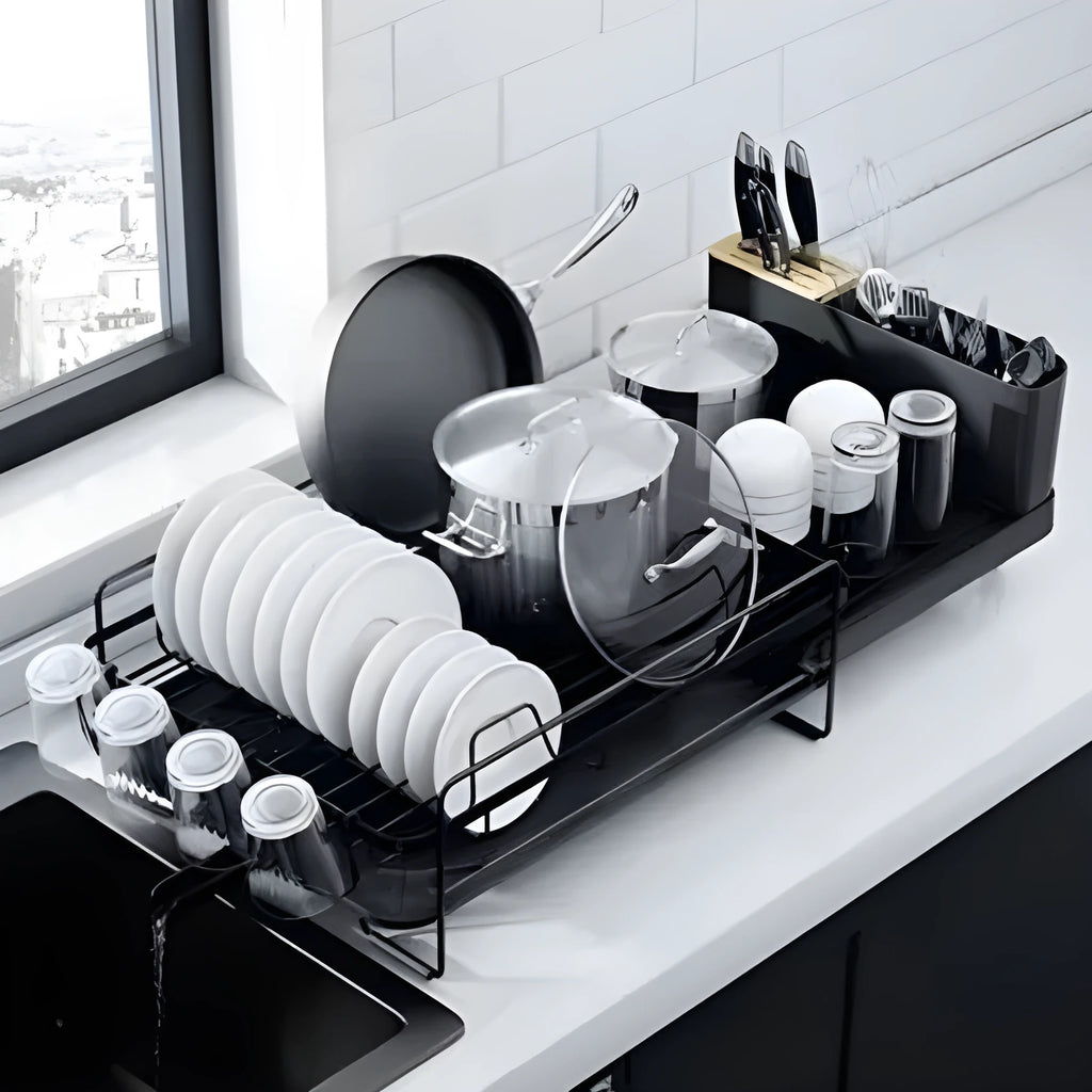 Retractable carbon steel kitchen dish drain rack for cutlery and cups on a countertop
