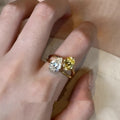 Geometric copper open ring for women with a water drop style contrasting stone.