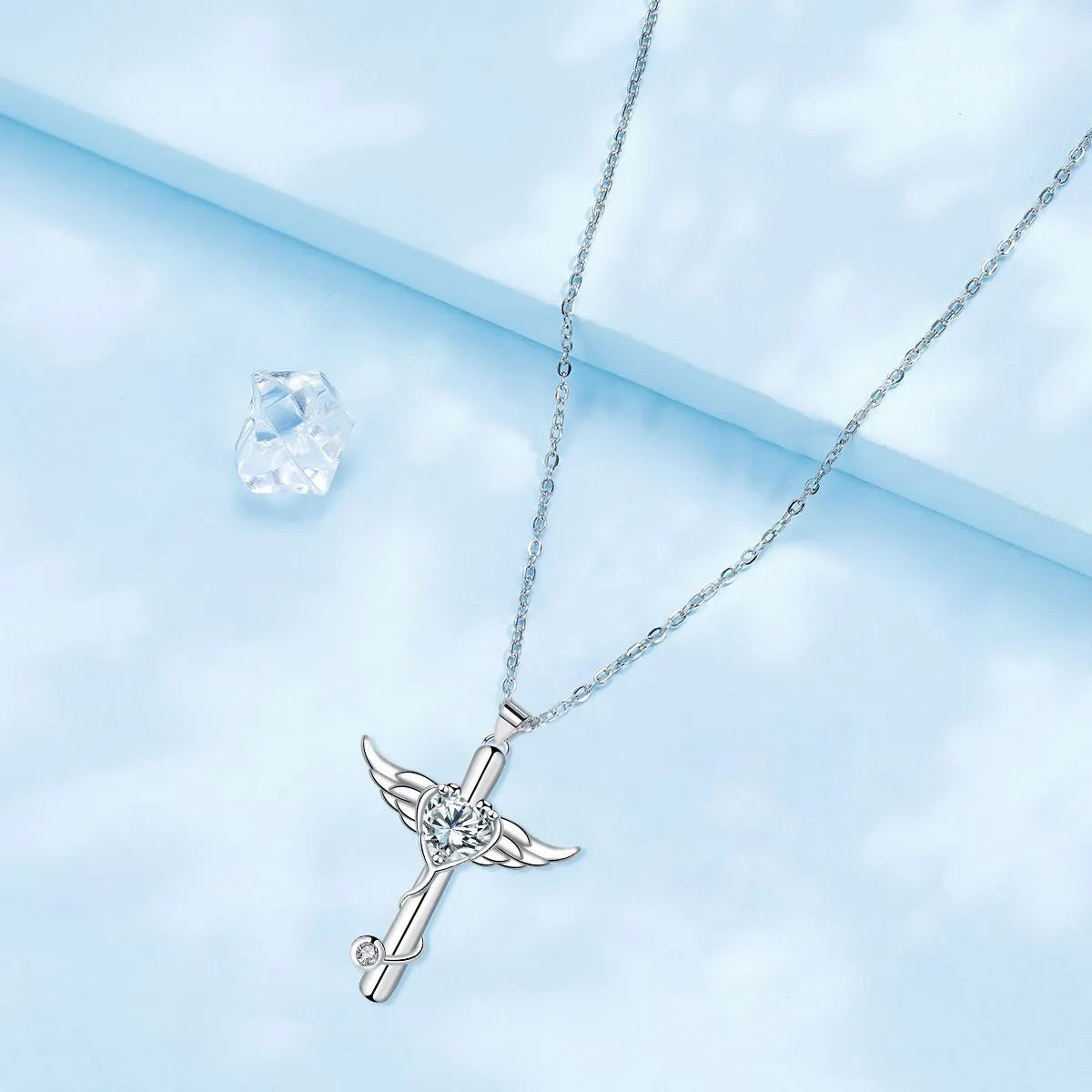 Silver-tone angel wings cross stethoscope necklace with diamond accent on copper chain