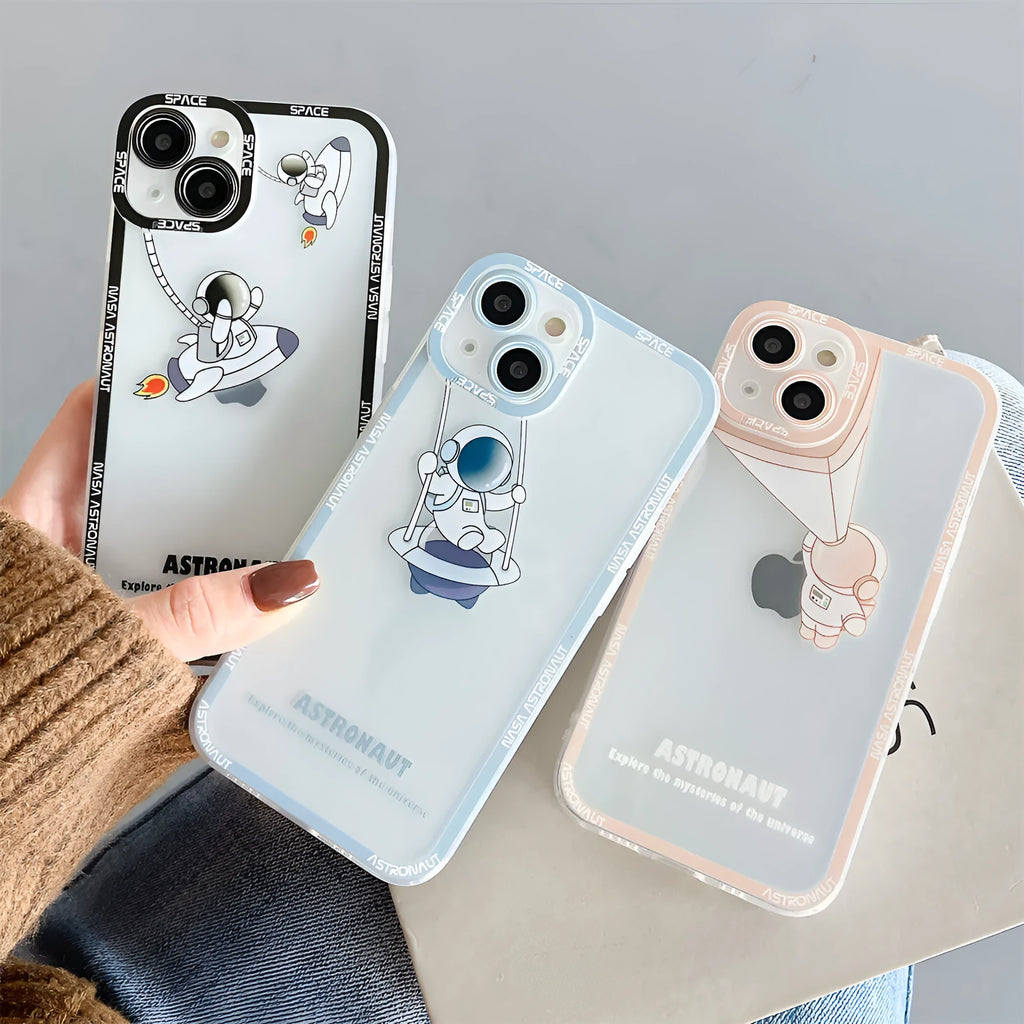 Transparent silicone iPhone case with astronaut print in blue, showing phone's original colour through clear background
