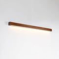 Walnut-coloured wood and acrylic minimalist LED strip wall lamp in three sizes on a white wall.