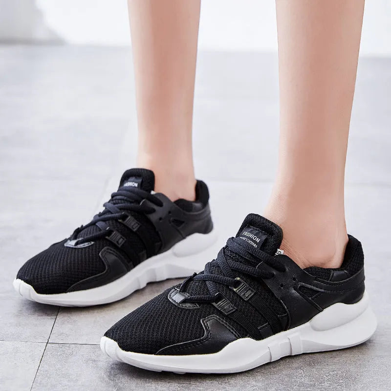 Breathable hollow-out mesh sneakers with low-top design and EVA sole in black and white colour options