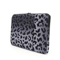 Leopard print laptop sleeve for 13-inch to 16-inch laptops with waterproof polyester construction
