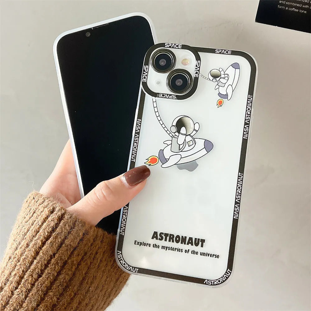 Transparent silicone iPhone case with astronaut print in blue, showing phone's original colour through clear background